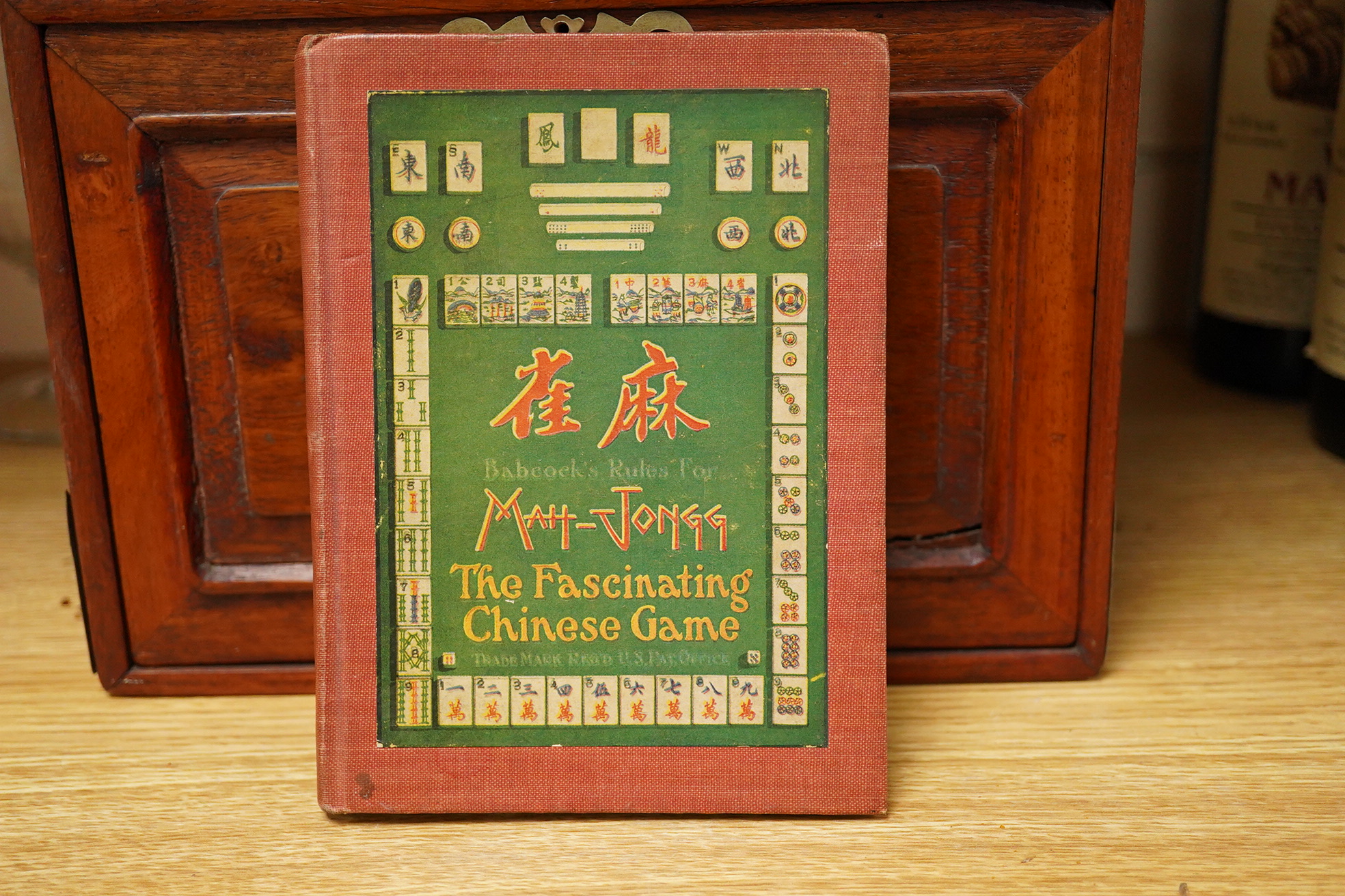 A Mah jong set an related book 24cm x 16.5cm high